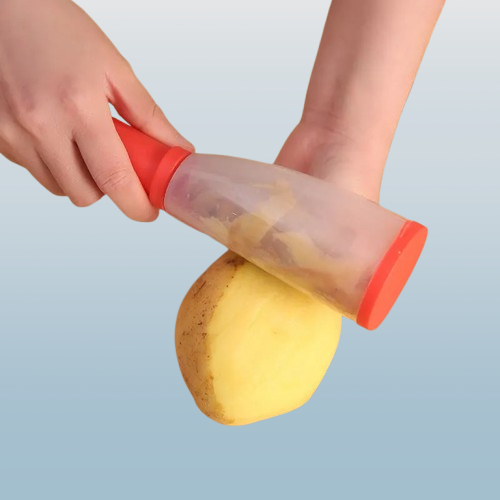 Multifunction Storage Peeler โ With Built-In Container for Food Scraps