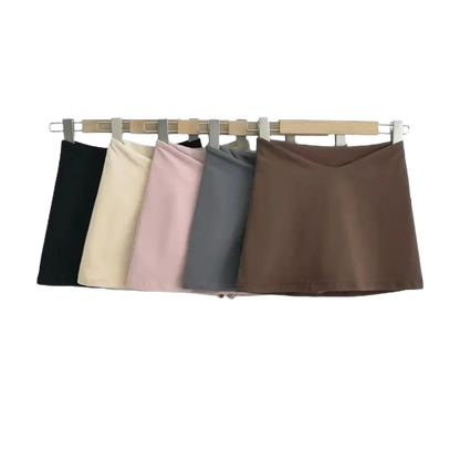 Junior Girl's Solid Color Low Waist Mini Skirt with Built-In Shorts – Elegant & Versatile Design
